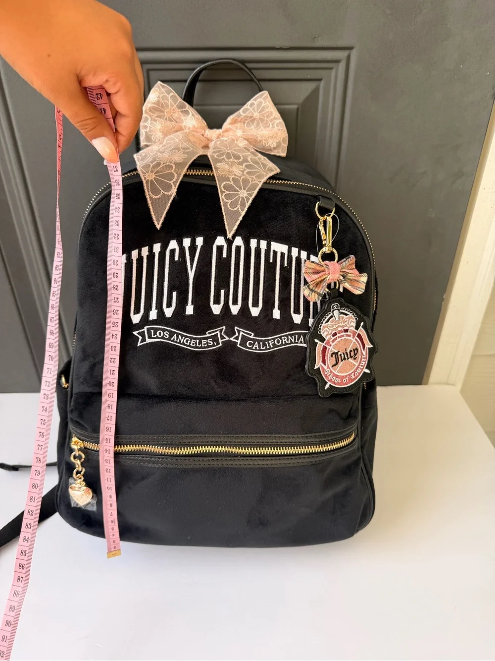 Juicy Couture Black Logo Velvet Backpack with Gold Hardware and Pink Charm